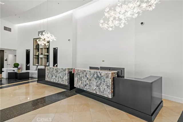 a living room with furniture and large window