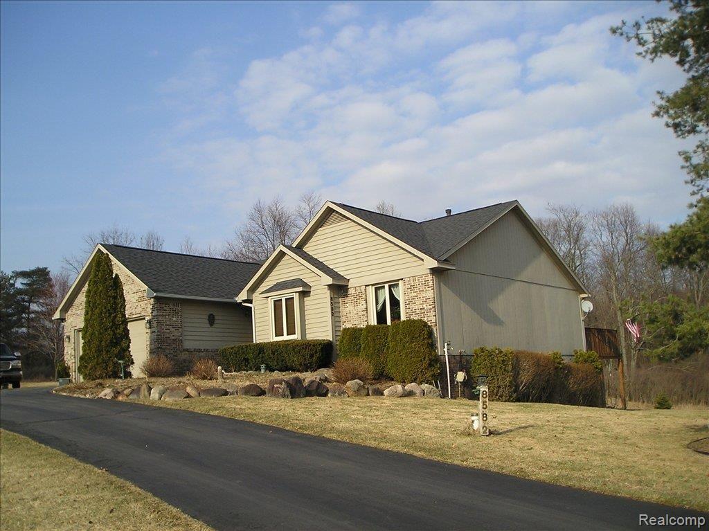 8582 Ridgeview Court Davisburg, MI 48350 - Photo 1 of 14 Front