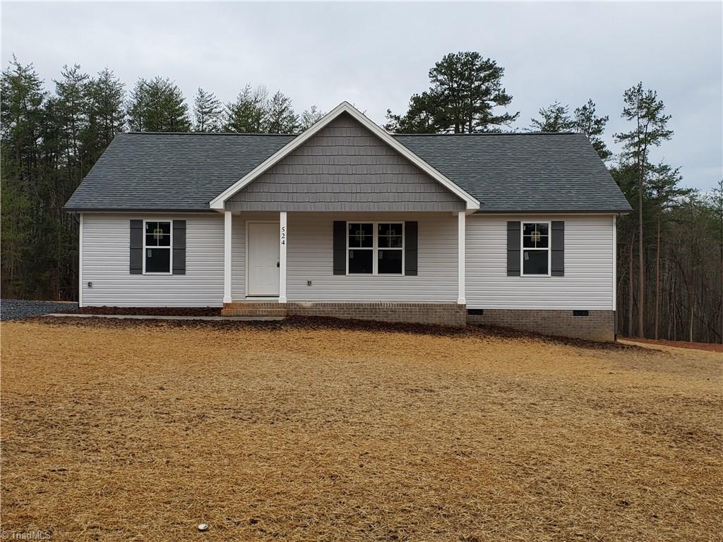 524 Price Farm Road Stokesdale, NC 27357 - Photo 1 of 8 Front View from Road