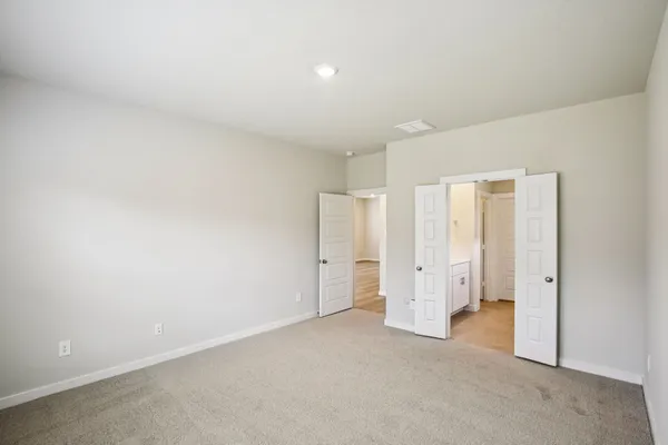 a bathroom with a double vanity sink mirror and double