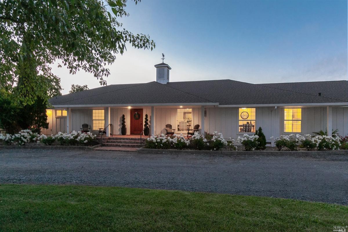 4615 Hall Road Santa Rosa, CA 95401 - Photo 1 of 1 a front view of a house with a yard