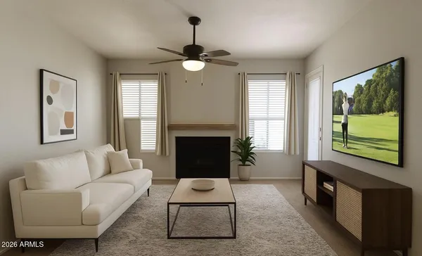 a living room with furniture and a fireplace
