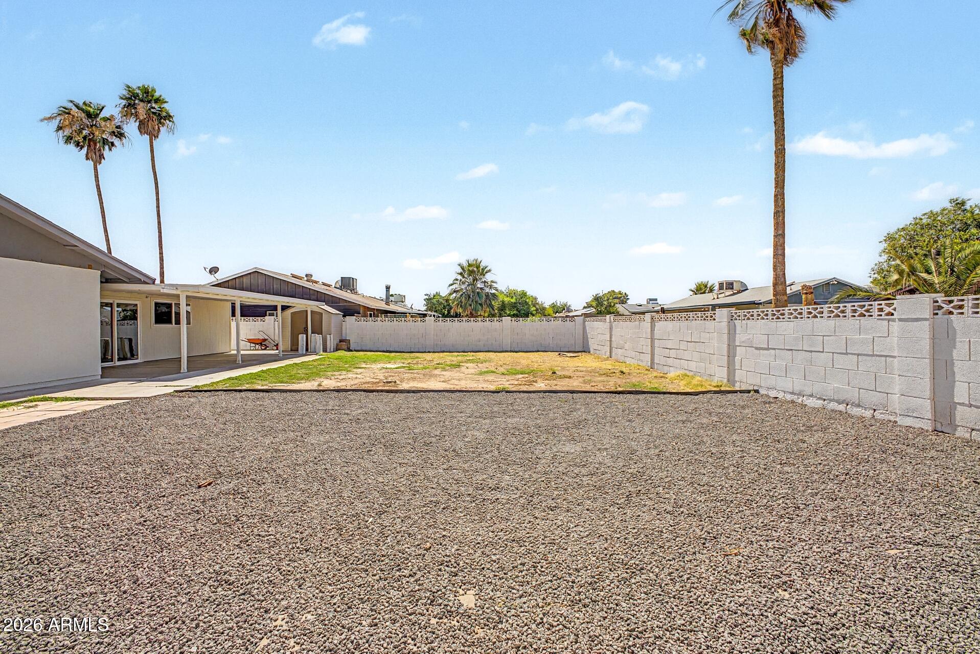 5232 West Hearn Road Glendale, AZ 85306 - Photo 25 of 32 a view of a swimming pool with a lake