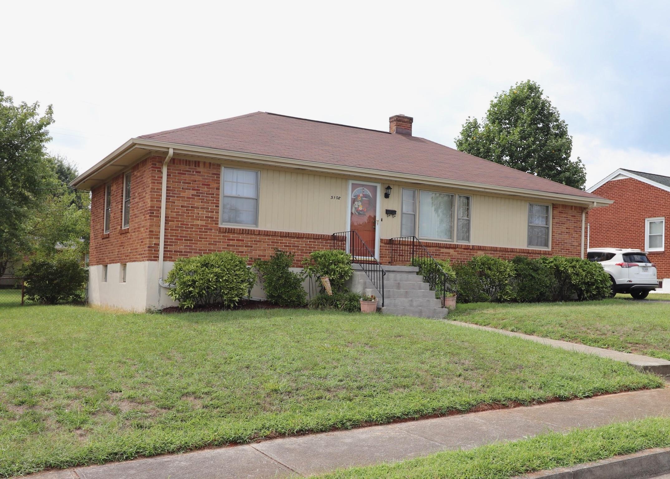 5108 Hazelridge Road Northwest Roanoke, VA 24012 - Photo 2 of 24 a front view of a house with yard and green space