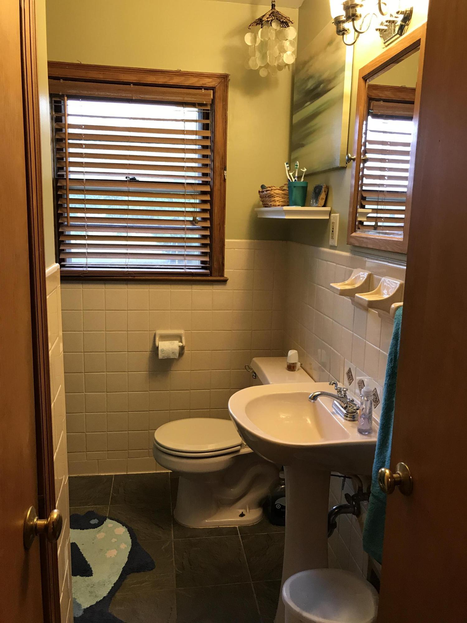 5108 Hazelridge Road Northwest Roanoke, VA 24012 - Photo 13 of 24 a bathroom with a sink and a toilet
