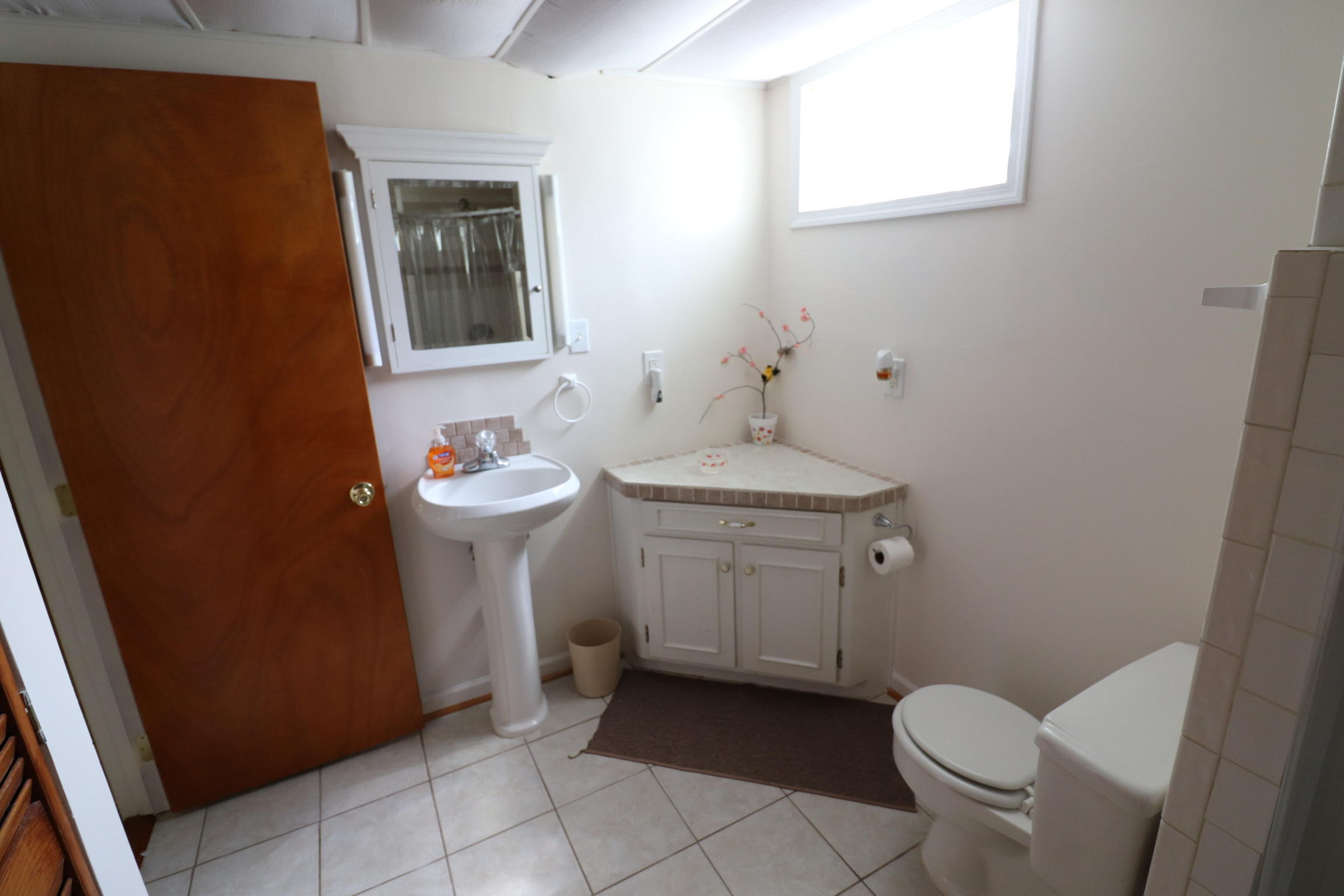 5108 Hazelridge Road Northwest Roanoke, VA 24012 - Photo 19 of 24 a bathroom with a sink toilet and vanity