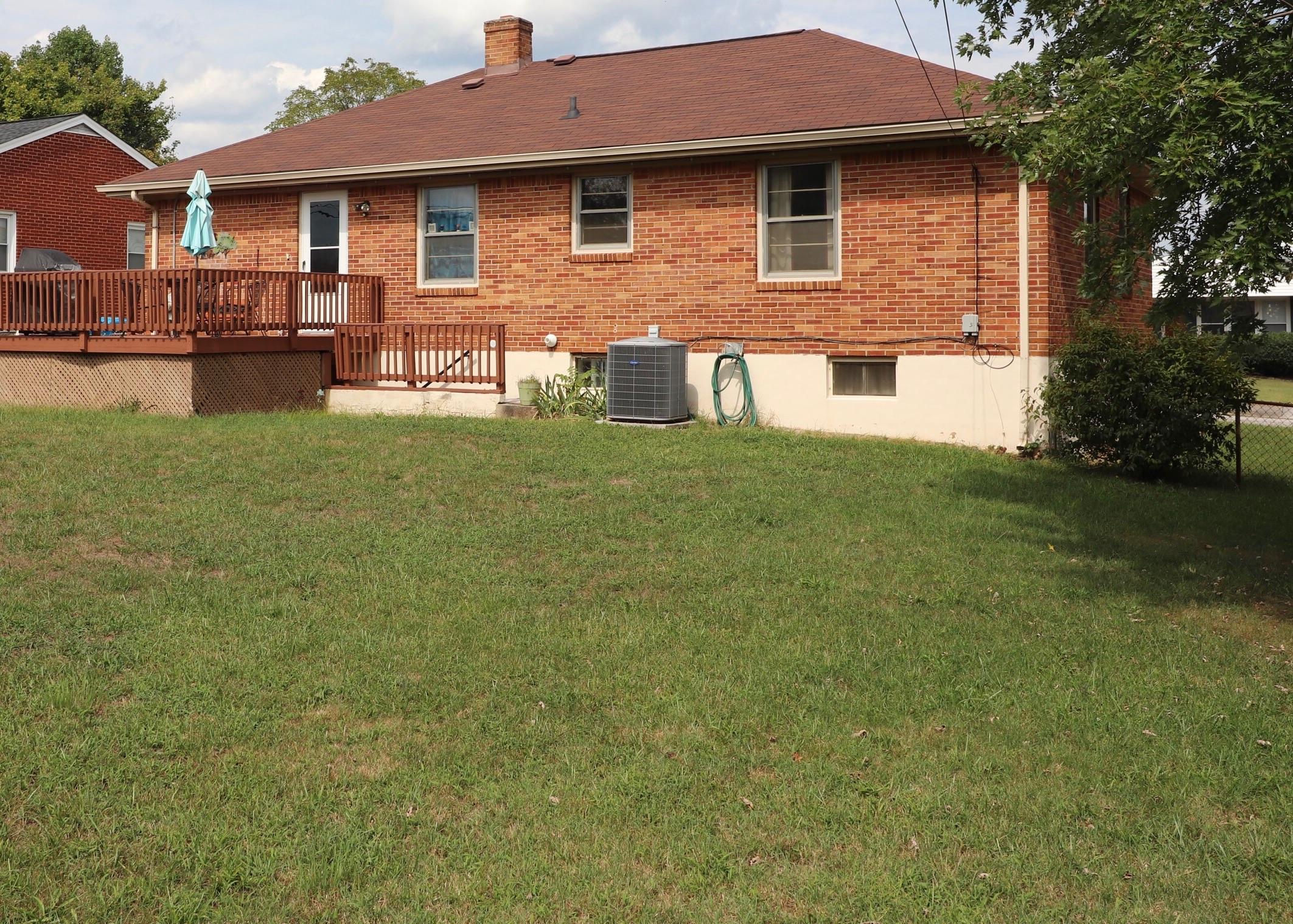 5108 Hazelridge Road Northwest Roanoke, VA 24012 - Photo 21 of 24 a front view of a house with garden