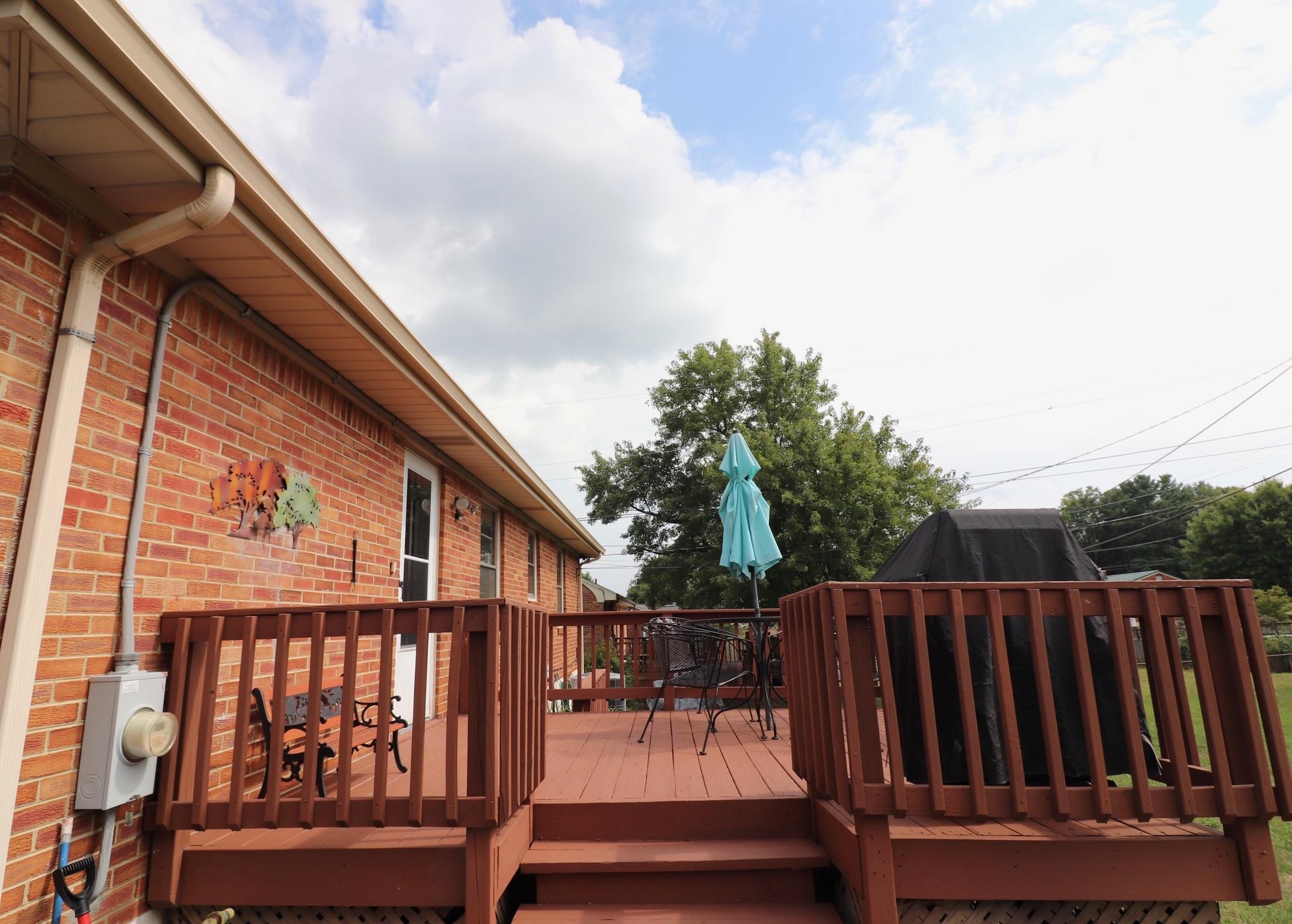 5108 Hazelridge Road Northwest Roanoke, VA 24012 - Photo 22 of 24 a view of balcony with wooden floor and fence