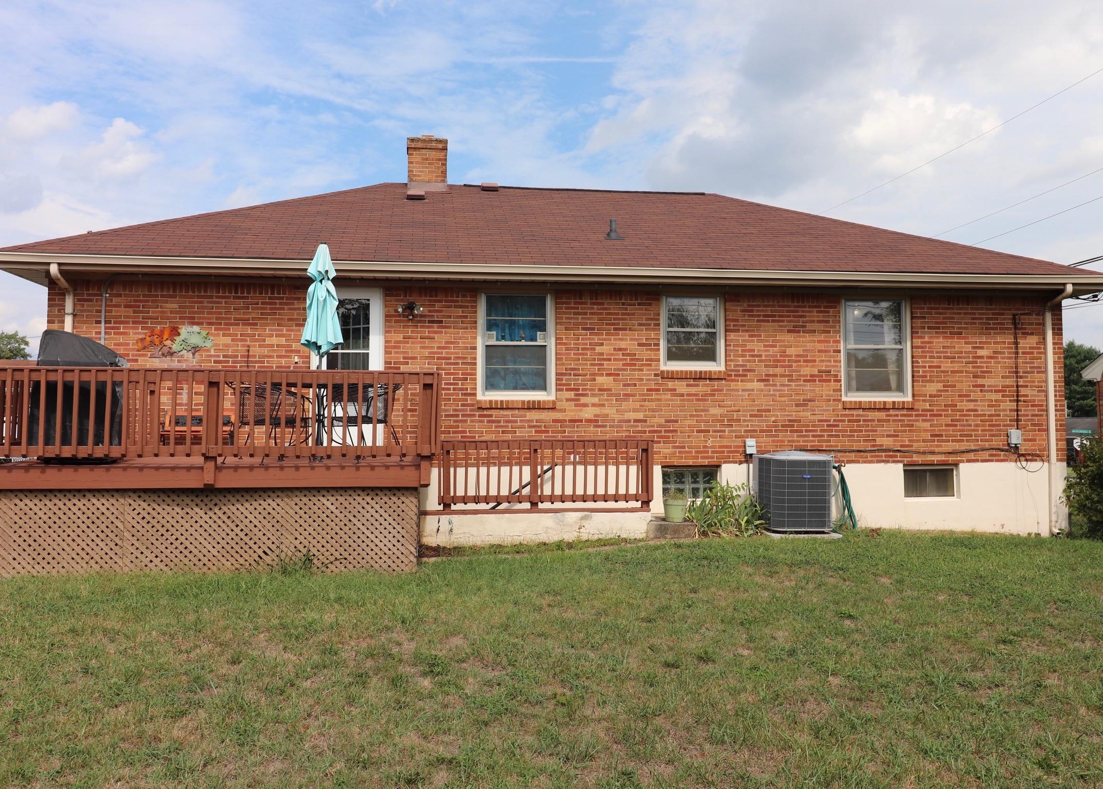 5108 Hazelridge Road Northwest Roanoke, VA 24012 - Photo 24 of 24 a front view of a house with garden