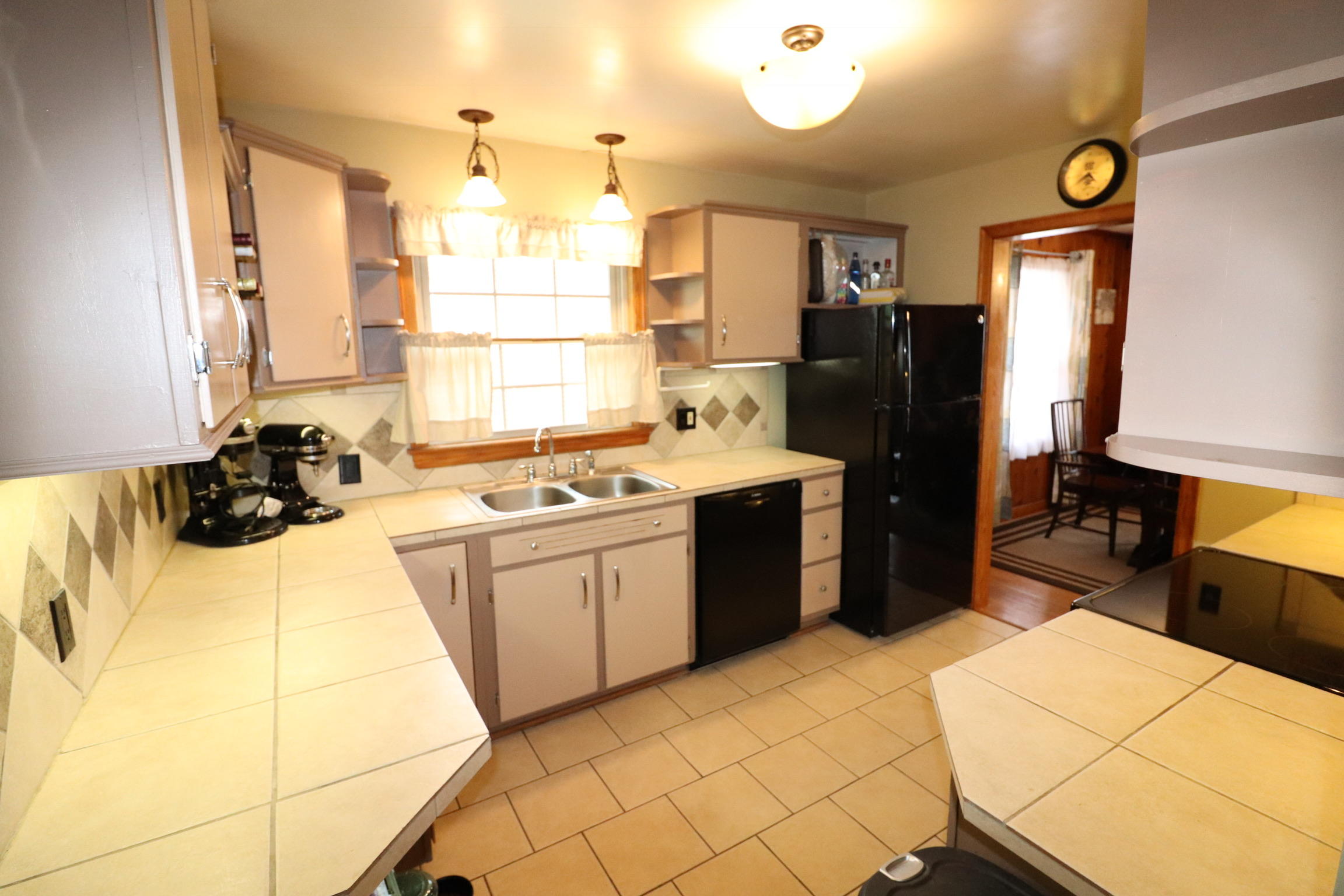 5108 Hazelridge Road Northwest Roanoke, VA 24012 - Photo 8 of 24 a kitchen with a sink appliances and cabinets
