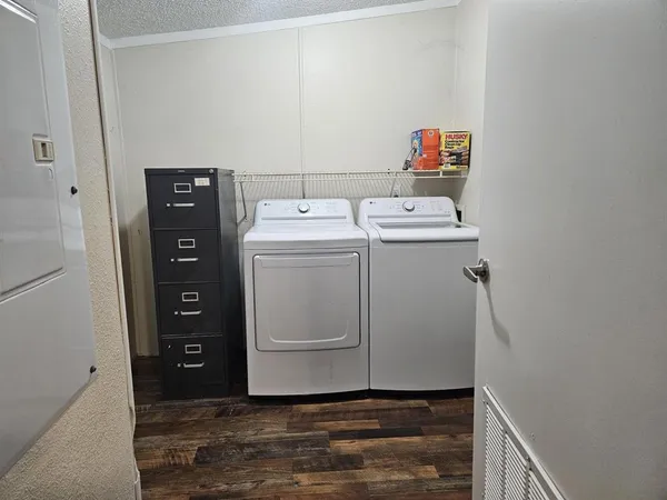 a utility room with dryer and washer