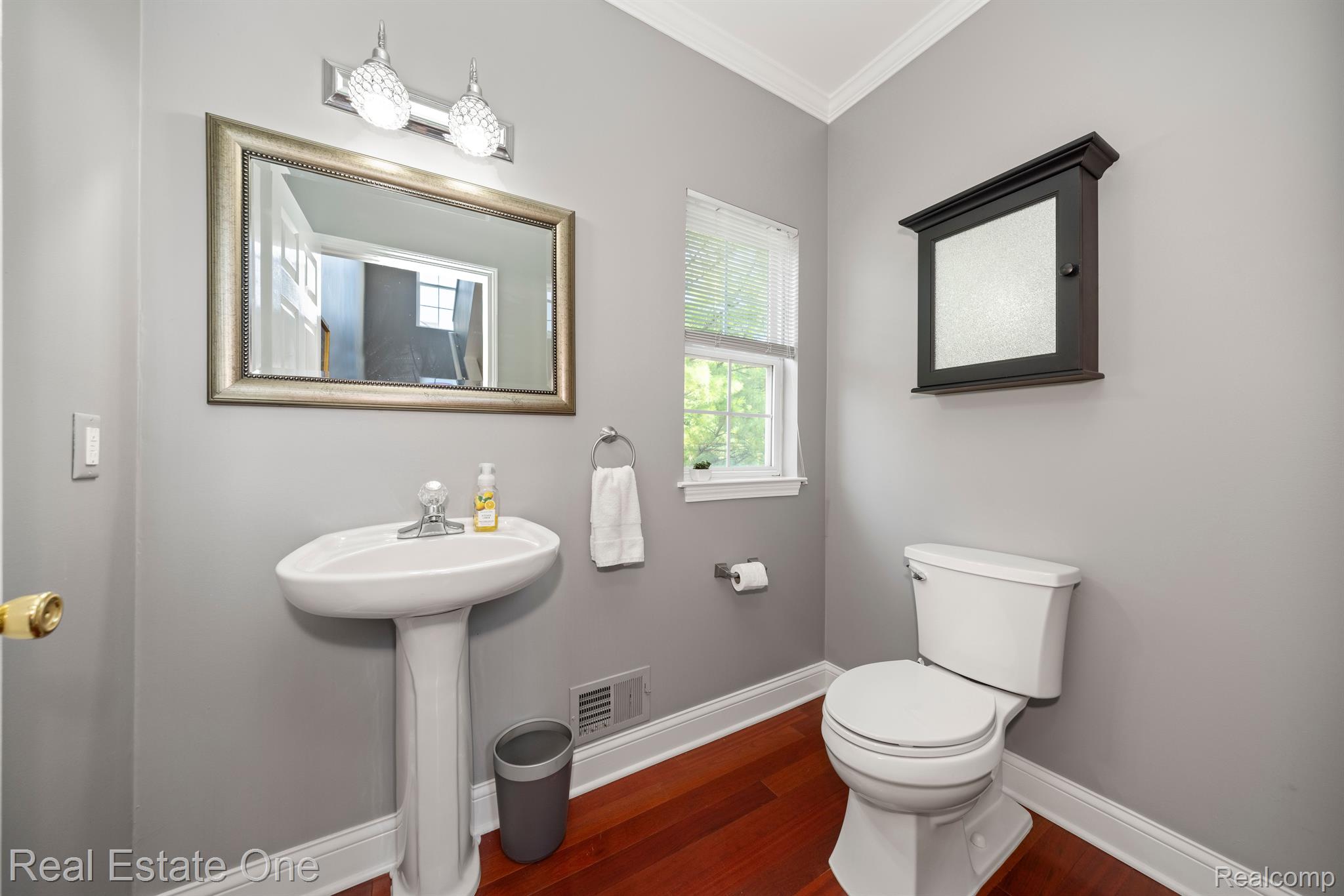 2650 Crooks Road, Unit 1 Royal Oak, MI 48073 - Photo 21 of 41 Main floor powder room, also with Brazilian hardwd