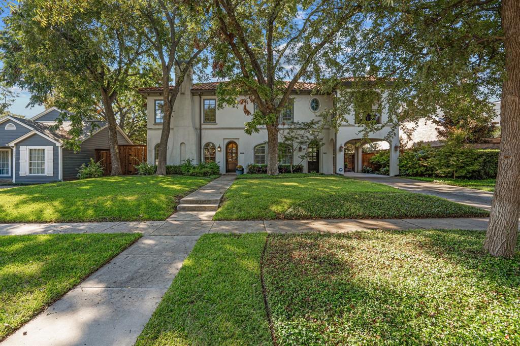 5609 El Campo Avenue Fort Worth, TX 76107 - Photo 1 of 1 a view of a white house in front of a big yard with large trees