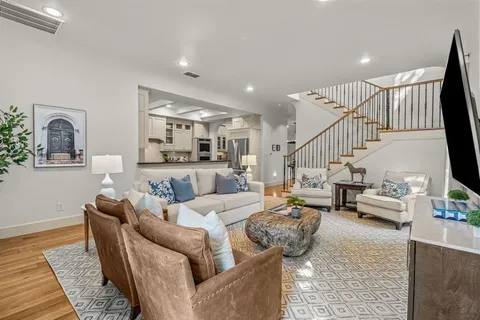 a living room with furniture and a table