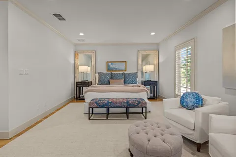 a bedroom with bed room and window