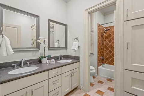 a bed room with a bed and a window