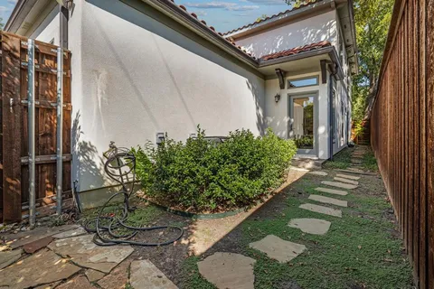 an aerial view of residential building with parking space