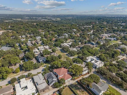 an aerial view of a city with lots of residential buildings