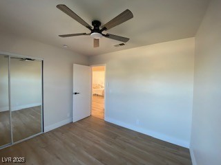 2712 Rialto Road Las Vegas, NV 89108 - Photo 45 of 54 Unfurnished bedroom featuring wood finished floors, a closet, and a ceiling fan