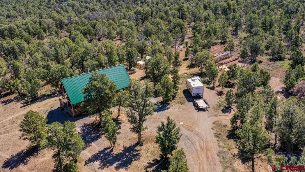 553 Cow Canyon Road Ignacio, CO 81137 - Photo 28 of 34 an aerial view of a house with a yard