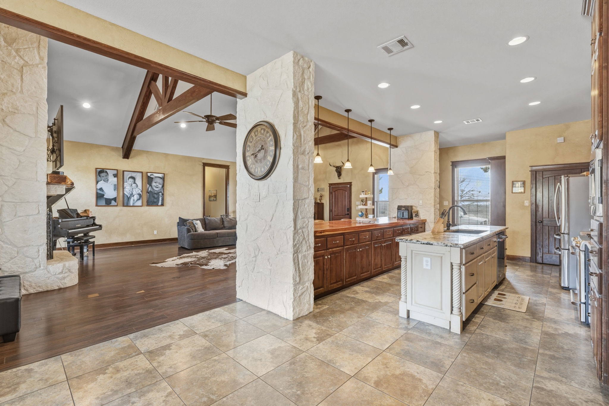 4999 Pin Oak Road Franklin, TX 77856 - Photo 17 of 47 a large white kitchen with a large window and refrigerator
