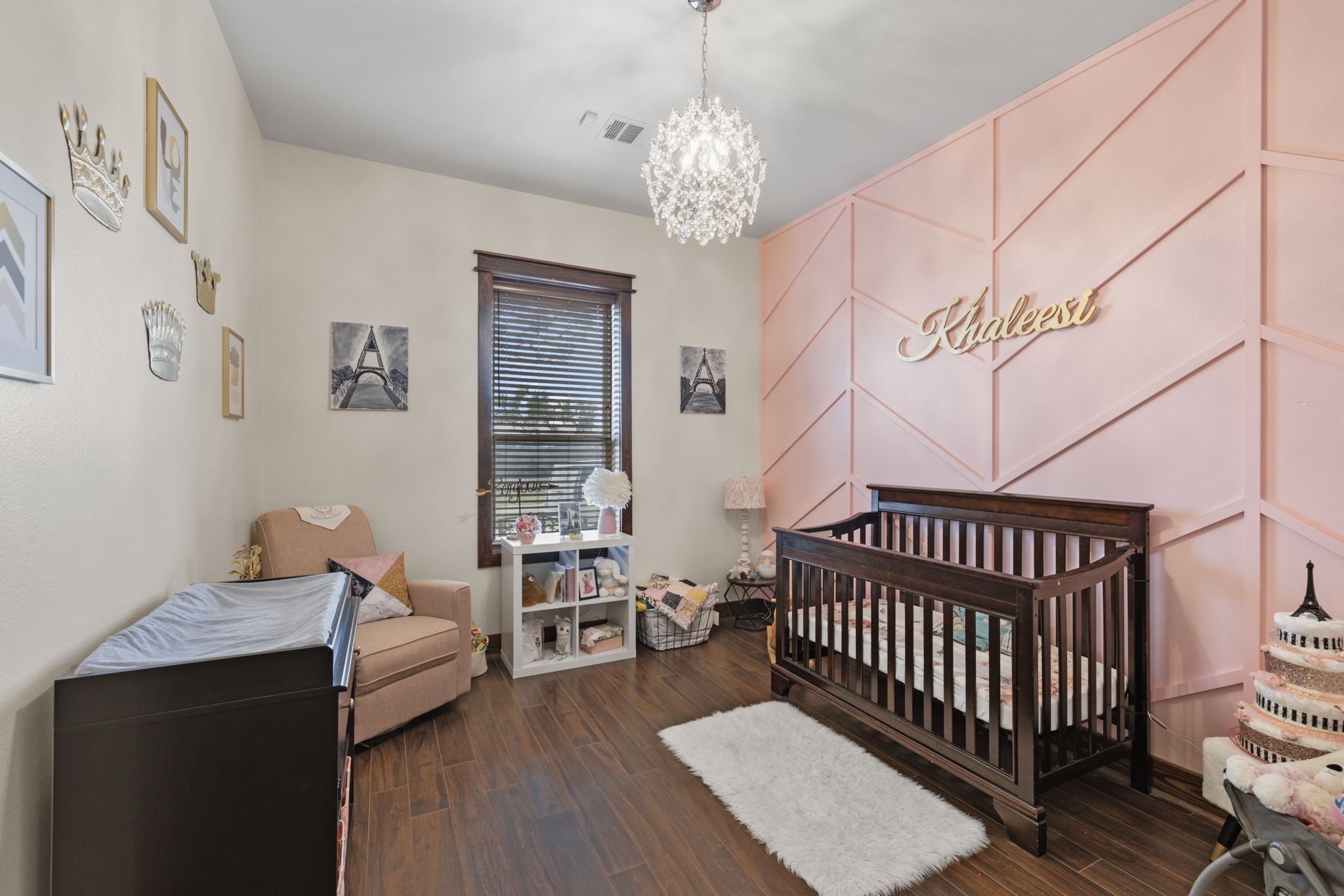 4999 Pin Oak Road Franklin, TX 77856 - Photo 20 of 47 a bedroom with furniture and a chandelier