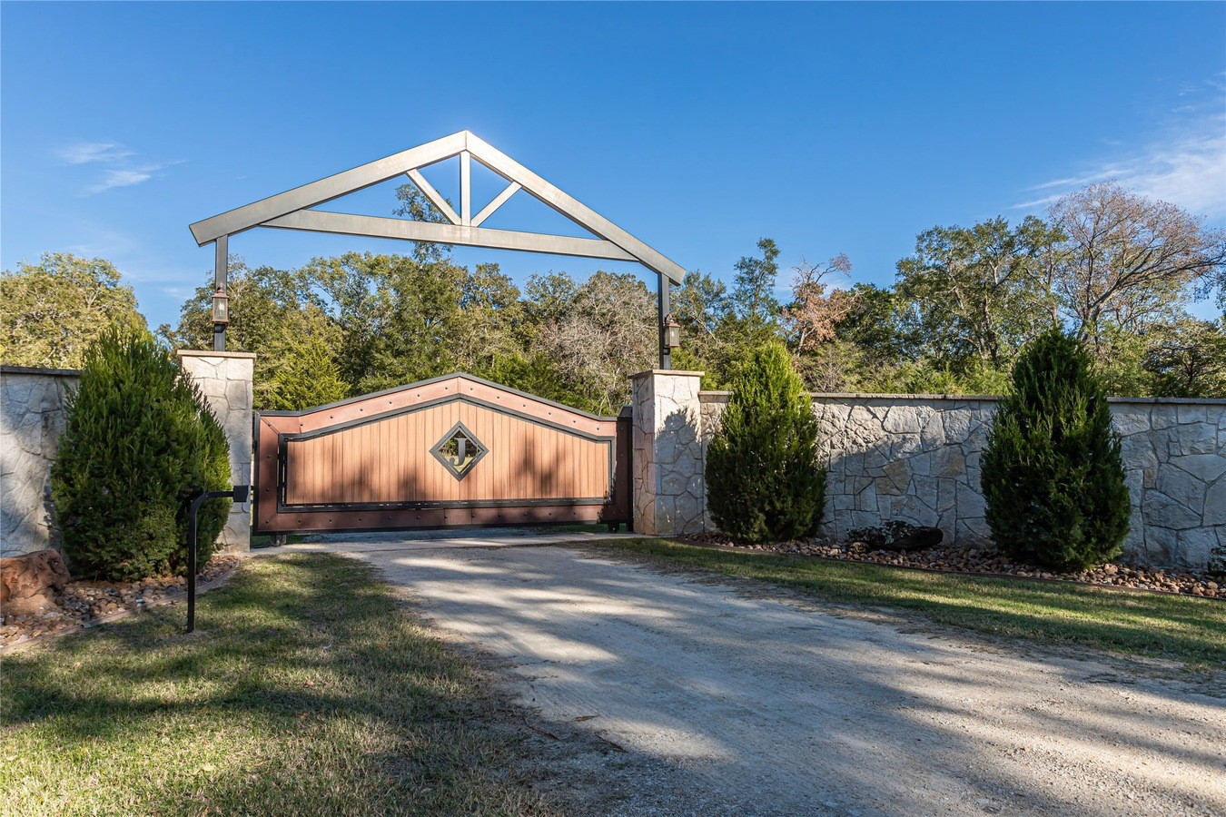 4999 Pin Oak Road Franklin, TX 77856 - Photo 2 of 47 a view of a house with a yard