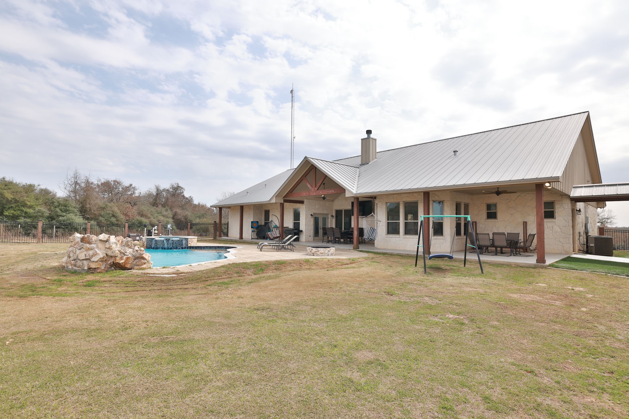 4999 Pin Oak Road Franklin, TX 77856 - Photo 42 of 47 a front view of a house with garden