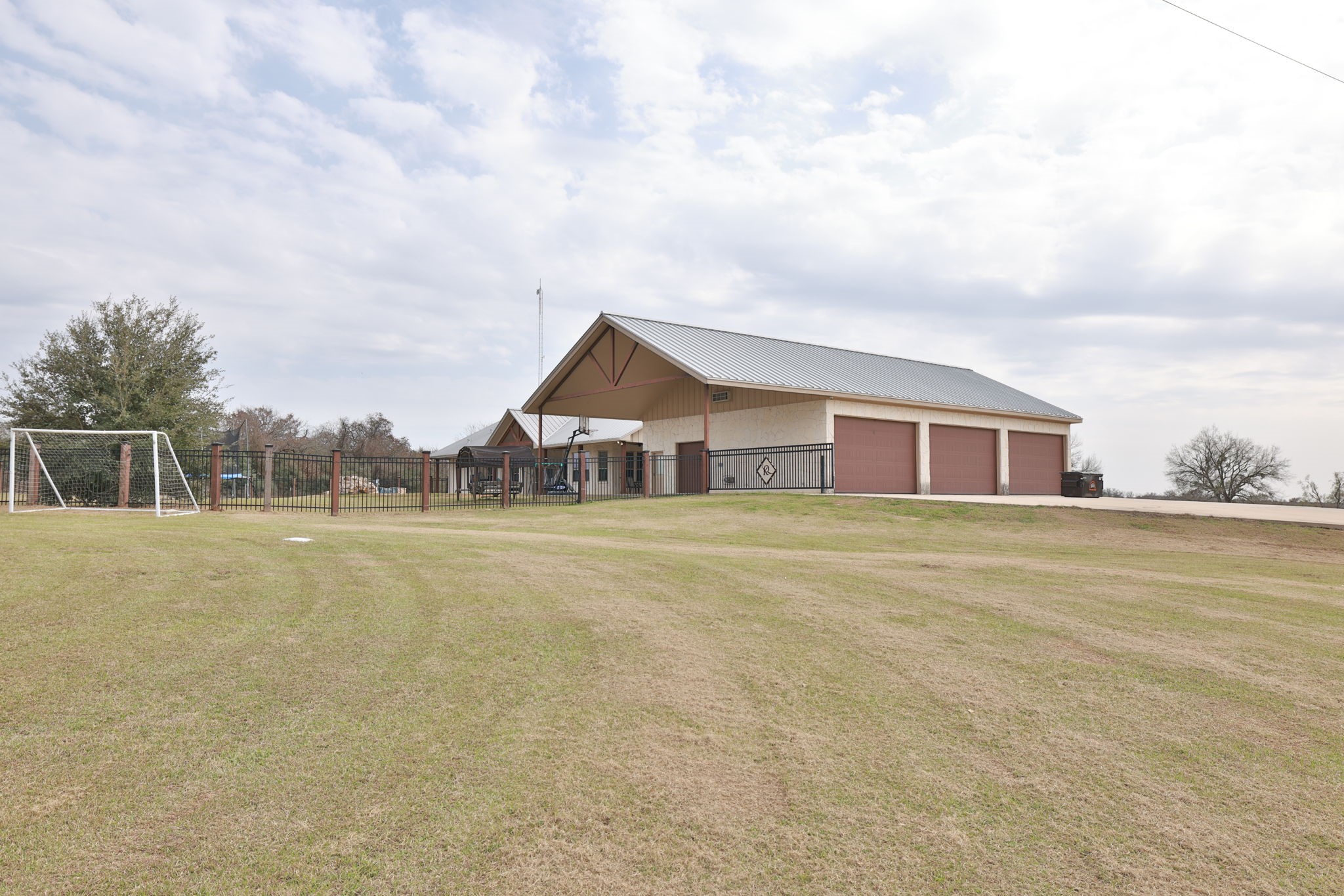 4999 Pin Oak Road Franklin, TX 77856 - Photo 46 of 47 a front view of a house with a yard