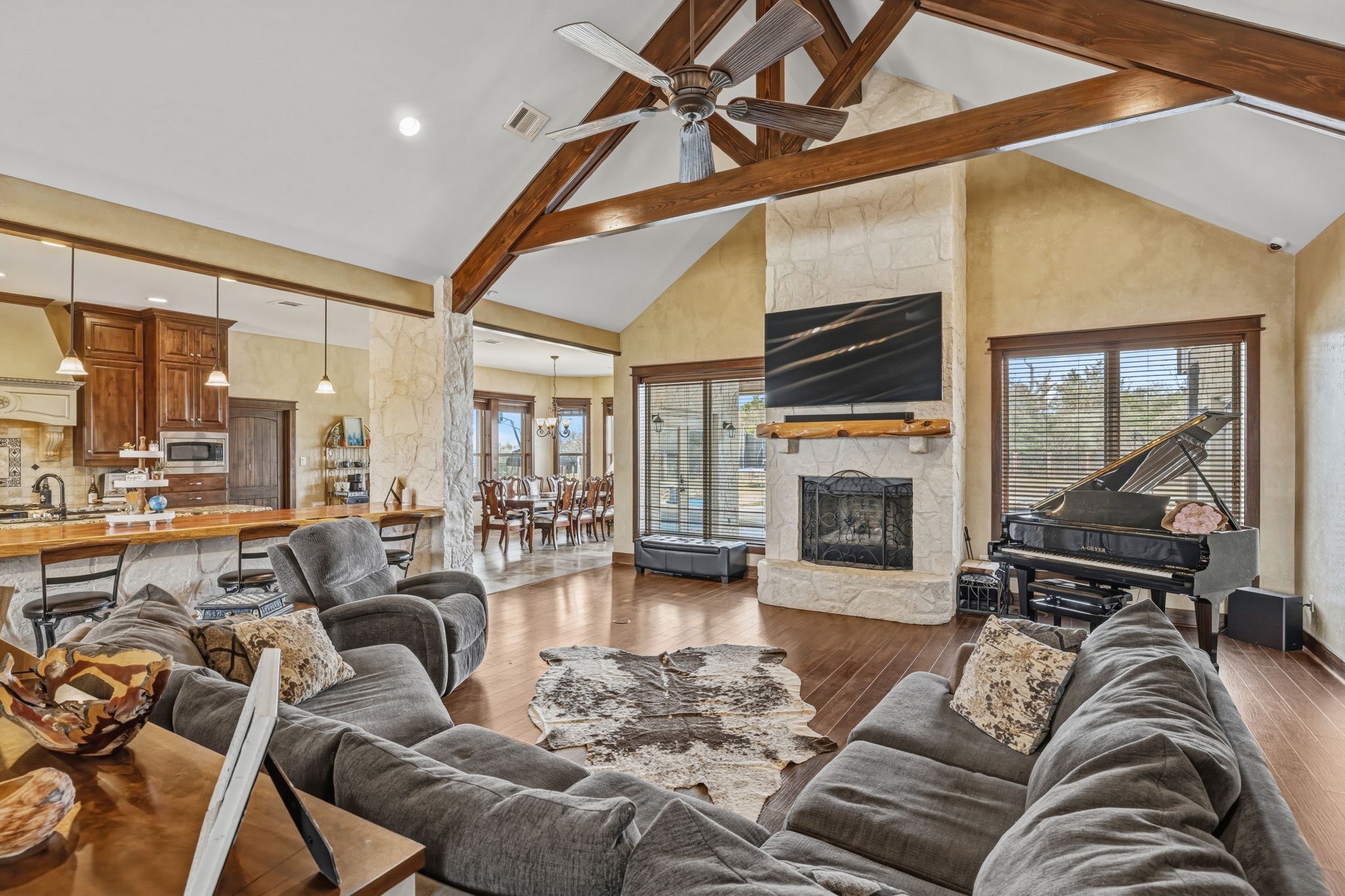 4999 Pin Oak Road Franklin, TX 77856 - Photo 7 of 47 a living room with furniture large window and flat screen tv