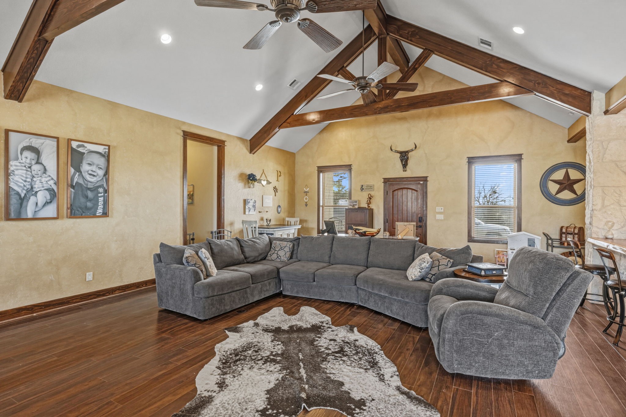 4999 Pin Oak Road Franklin, TX 77856 - Photo 9 of 47 a living room with furniture and a wooden floor