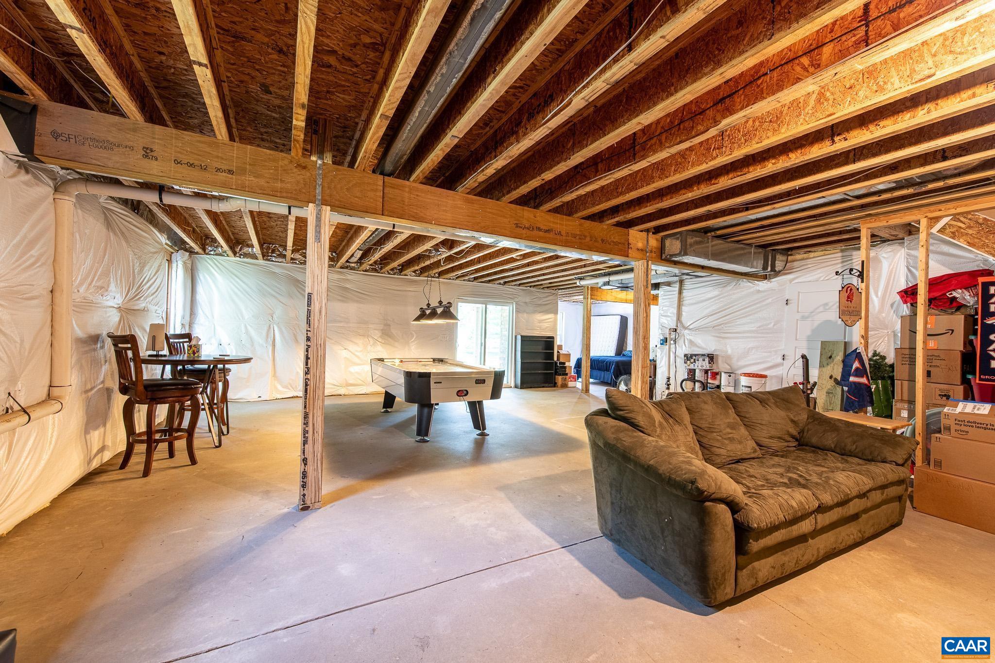 38 Timber Ridge Court Zion Crossroads, VA 22942 - Photo 44 of 72 a living room with furniture and a ceiling fan