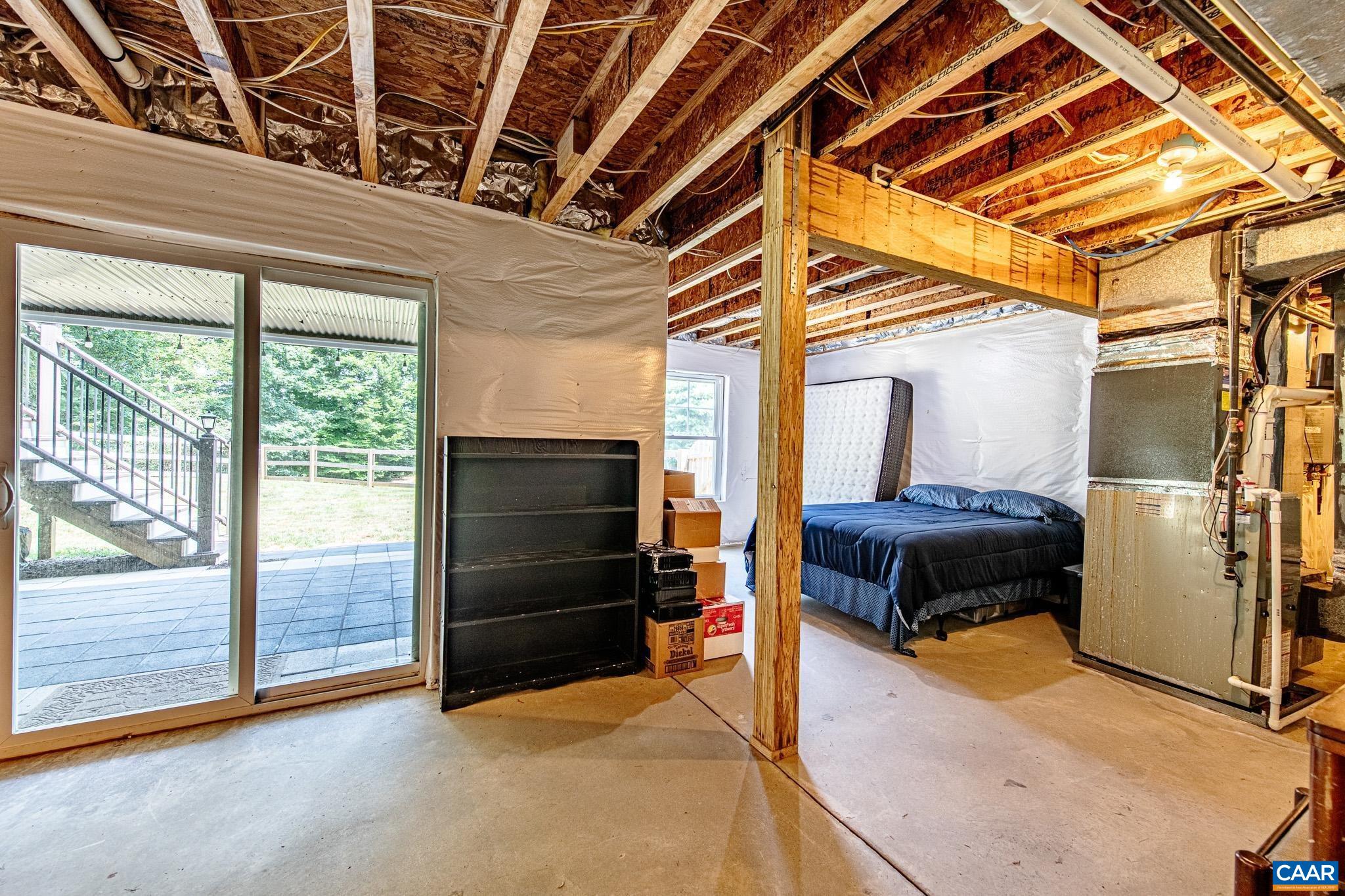 38 Timber Ridge Court Zion Crossroads, VA 22942 - Photo 45 of 72 a room with a bed and a walk in closet