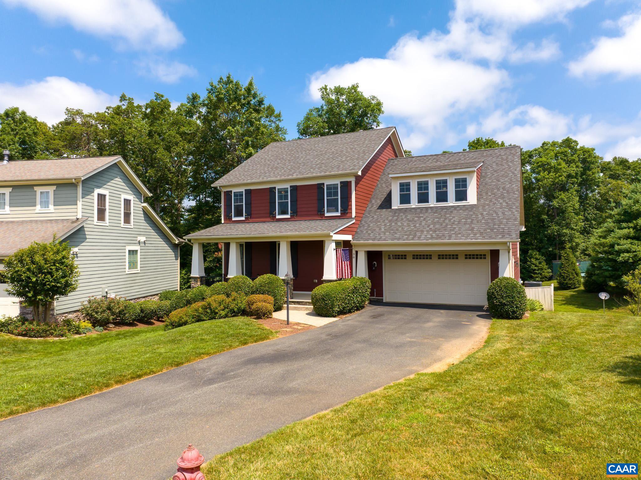 38 Timber Ridge Court Zion Crossroads, VA 22942 - Photo 53 of 72 a front view of a house with a yard and garage