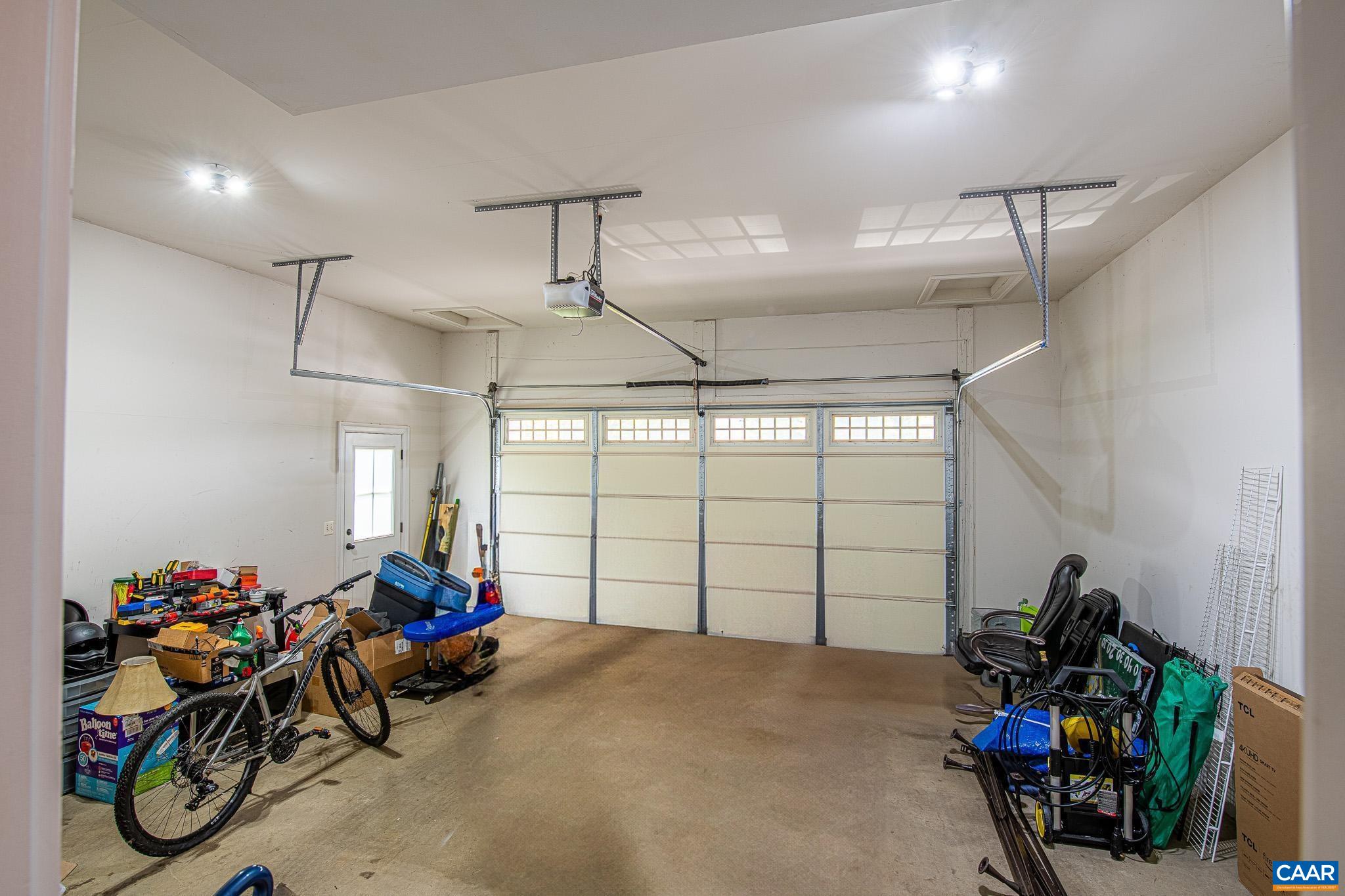38 Timber Ridge Court Zion Crossroads, VA 22942 - Photo 54 of 72 a view of a garage with a bike and a window
