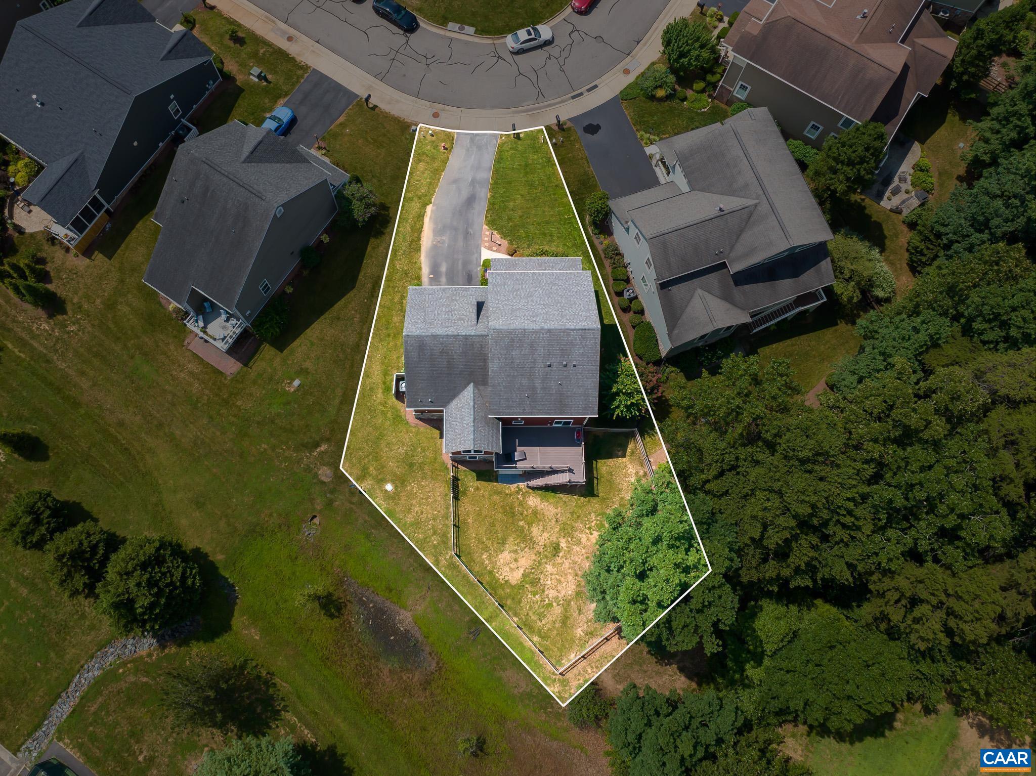 38 Timber Ridge Court Zion Crossroads, VA 22942 - Photo 7 of 72 an aerial view of house with pool patio and outdoor seating