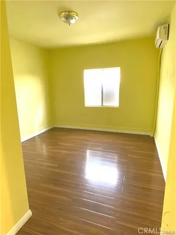 a view of room and wooden floor