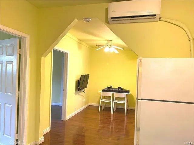 a bathroom with a shower and a mirror