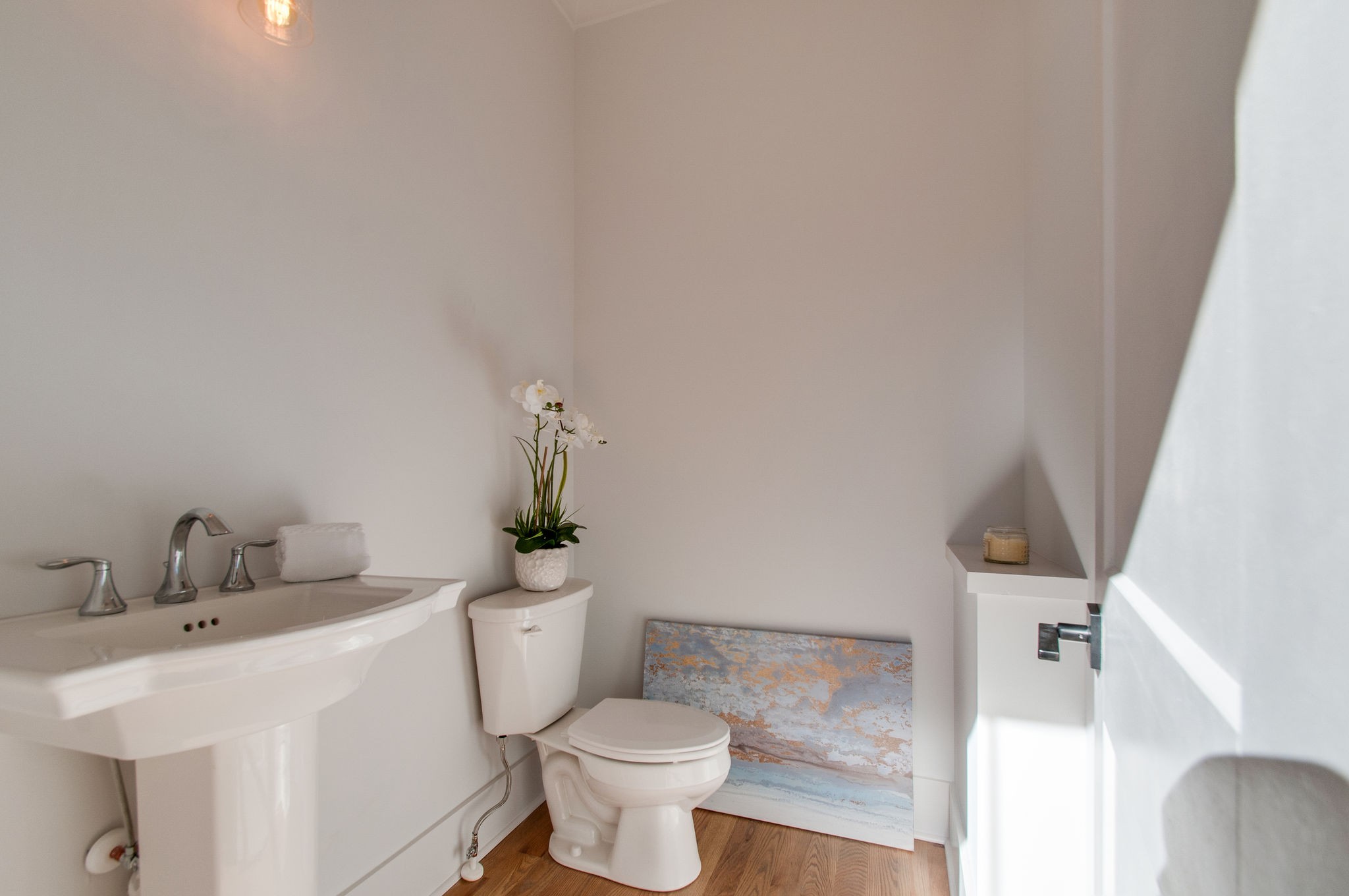 929 Mitchell Road Nashville, TN 37206 - Photo 15 of 48 a bathroom with a sink toilet and mirror