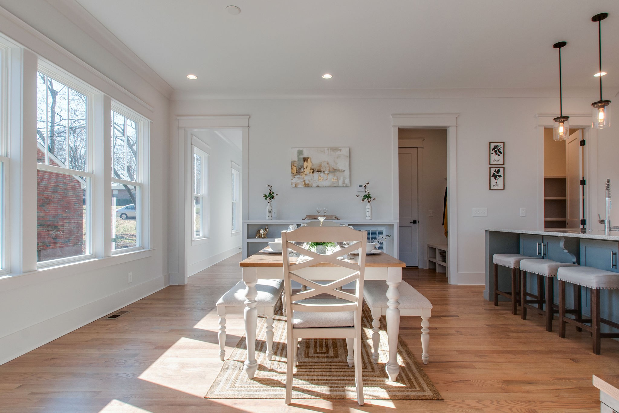 929 Mitchell Road Nashville, TN 37206 - Photo 7 of 48 a dining room with wooden floor and large windows