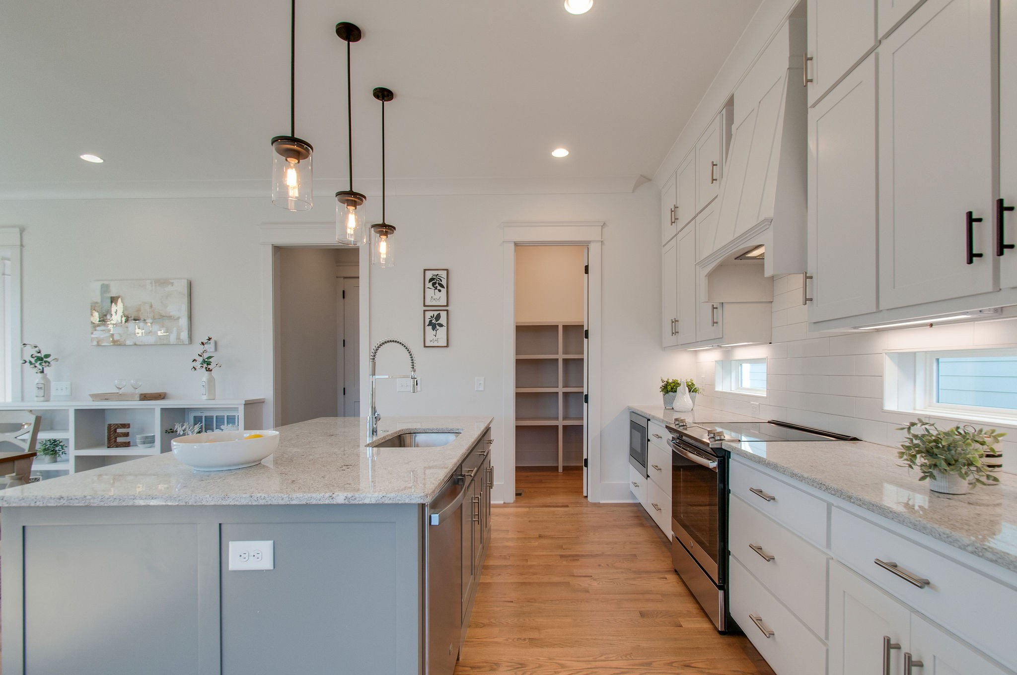 929 Mitchell Road Nashville, TN 37206 - Photo 10 of 48 a kitchen with granite countertop a sink stainless steel appliances and cabinets