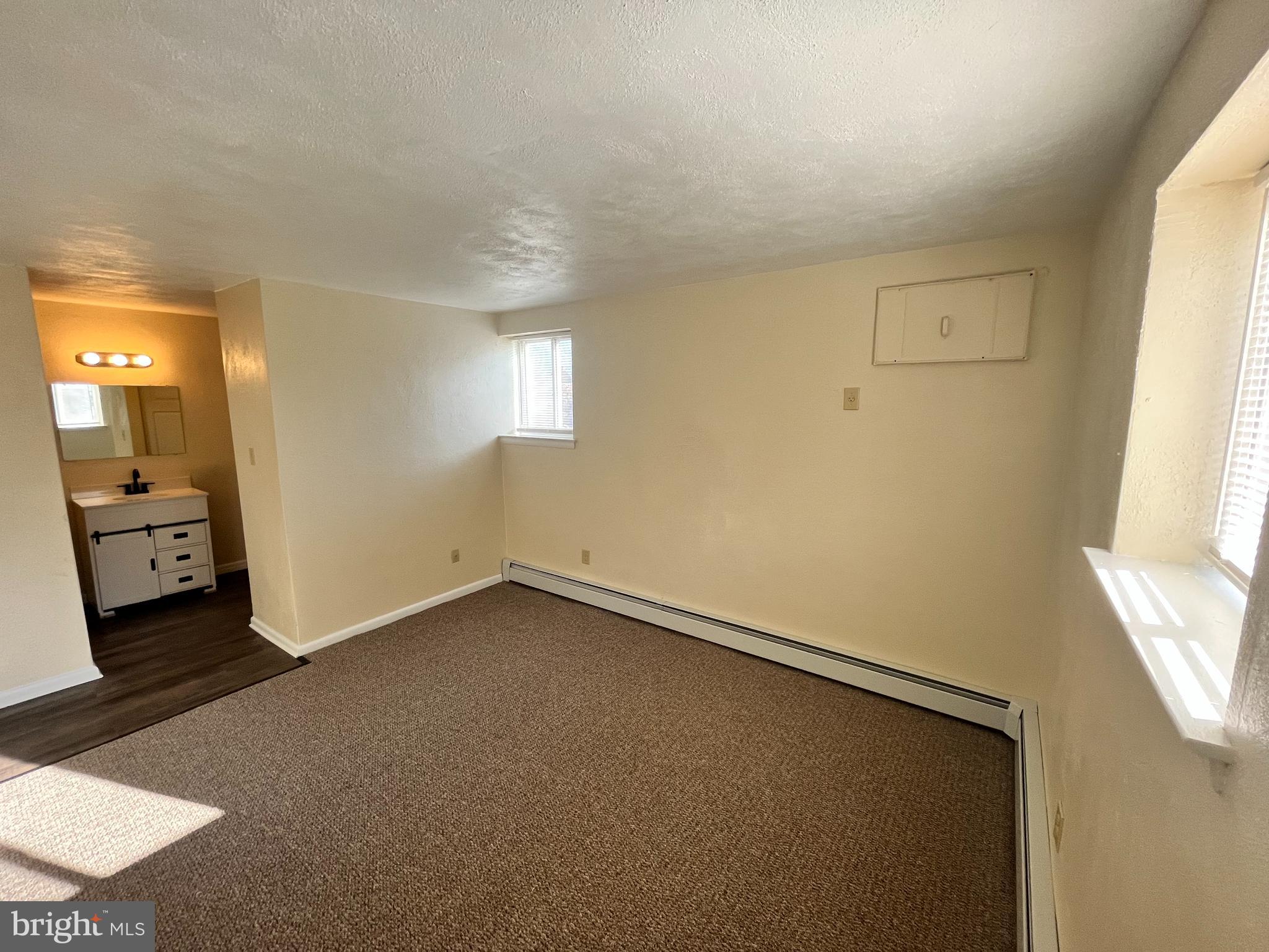 120 North Penn Street, Unit C2 Spring City, PA 19475 - Photo 6 of 7 an empty room with a bathroom