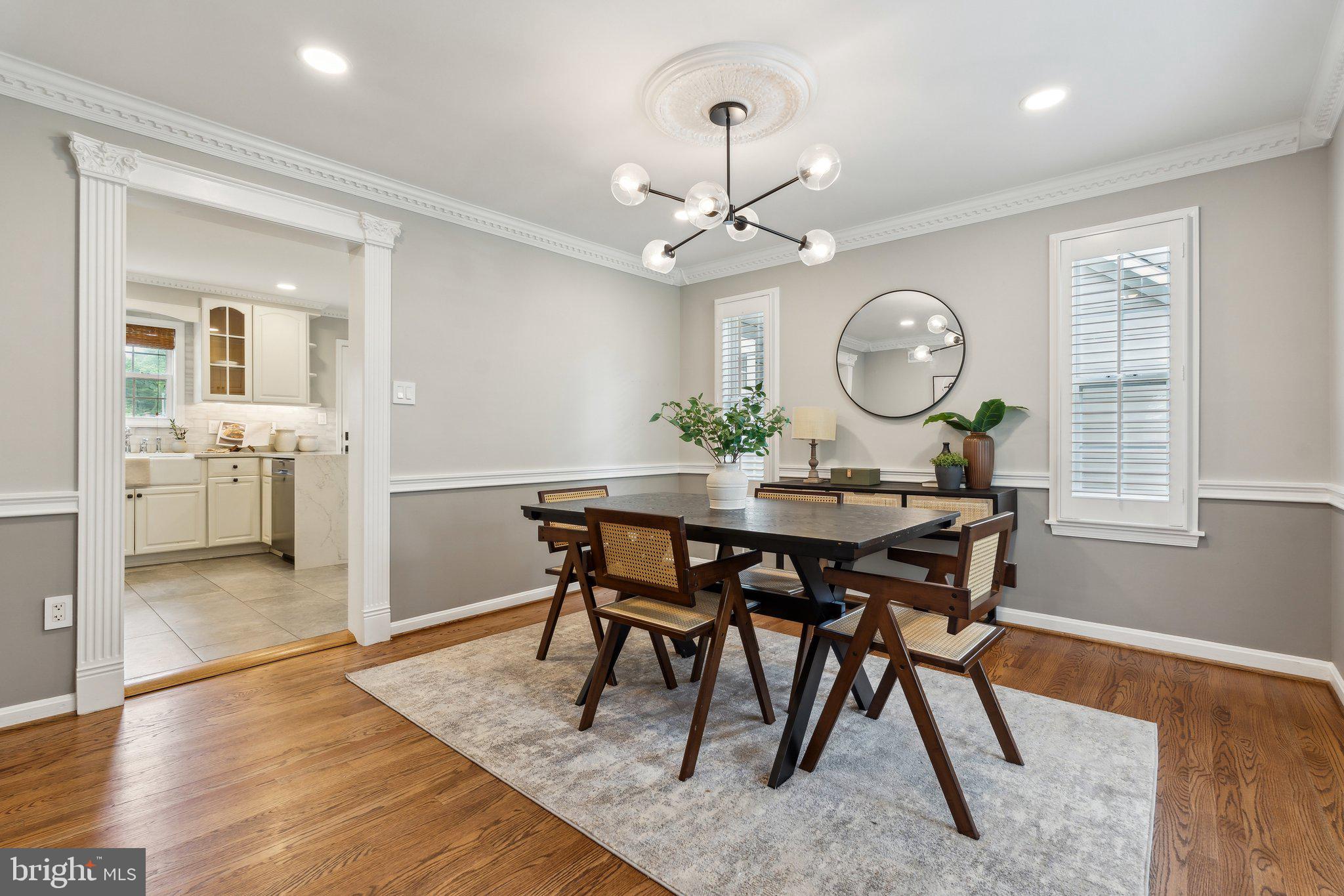 703 Roxboro Road Rockville, MD 20850 - Photo 20 of 55 a view of a dining room with furniture window and wooden floor