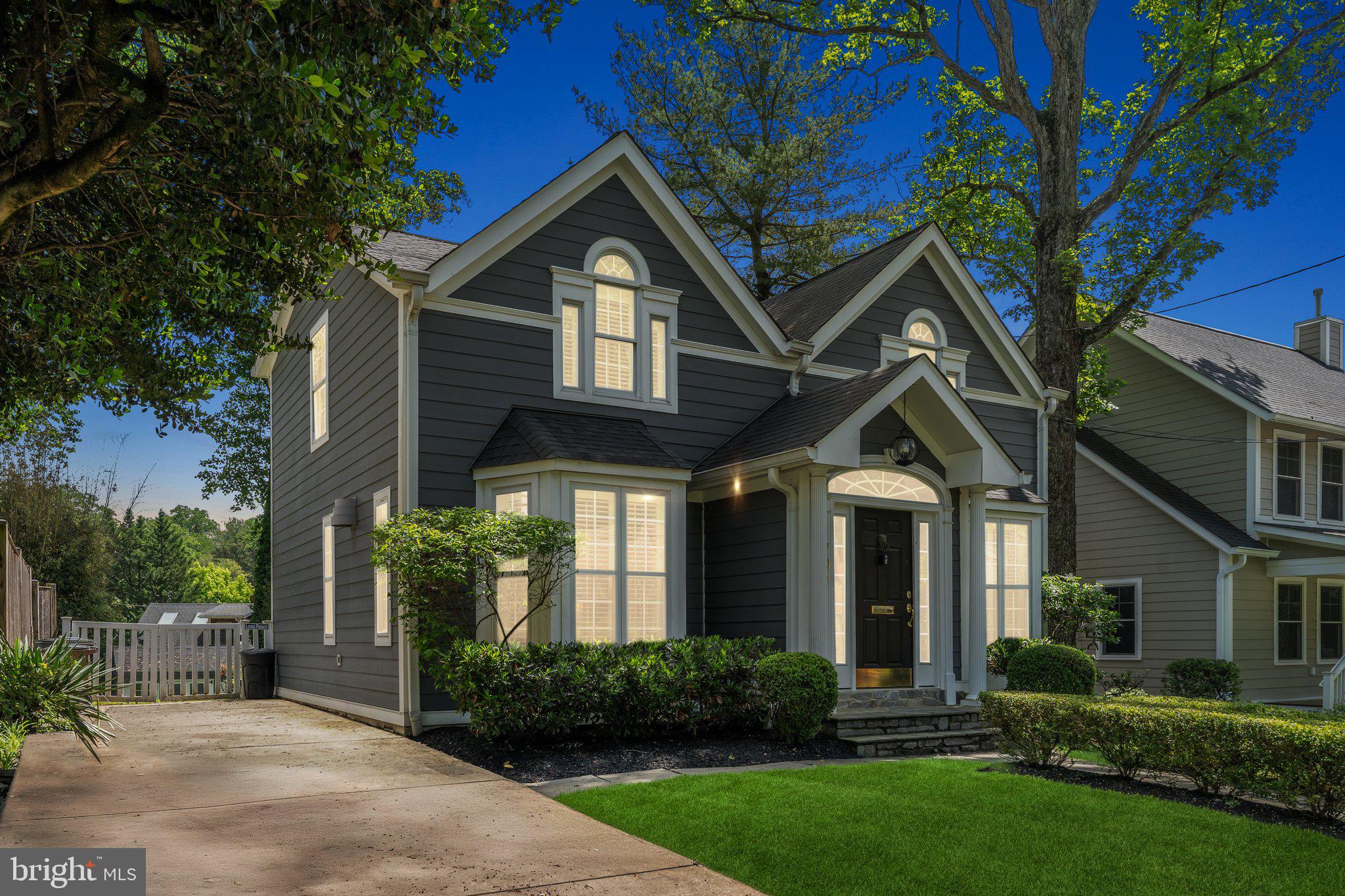 703 Roxboro Road Rockville, MD 20850 - Photo 2 of 55 a front view of a house with a yard