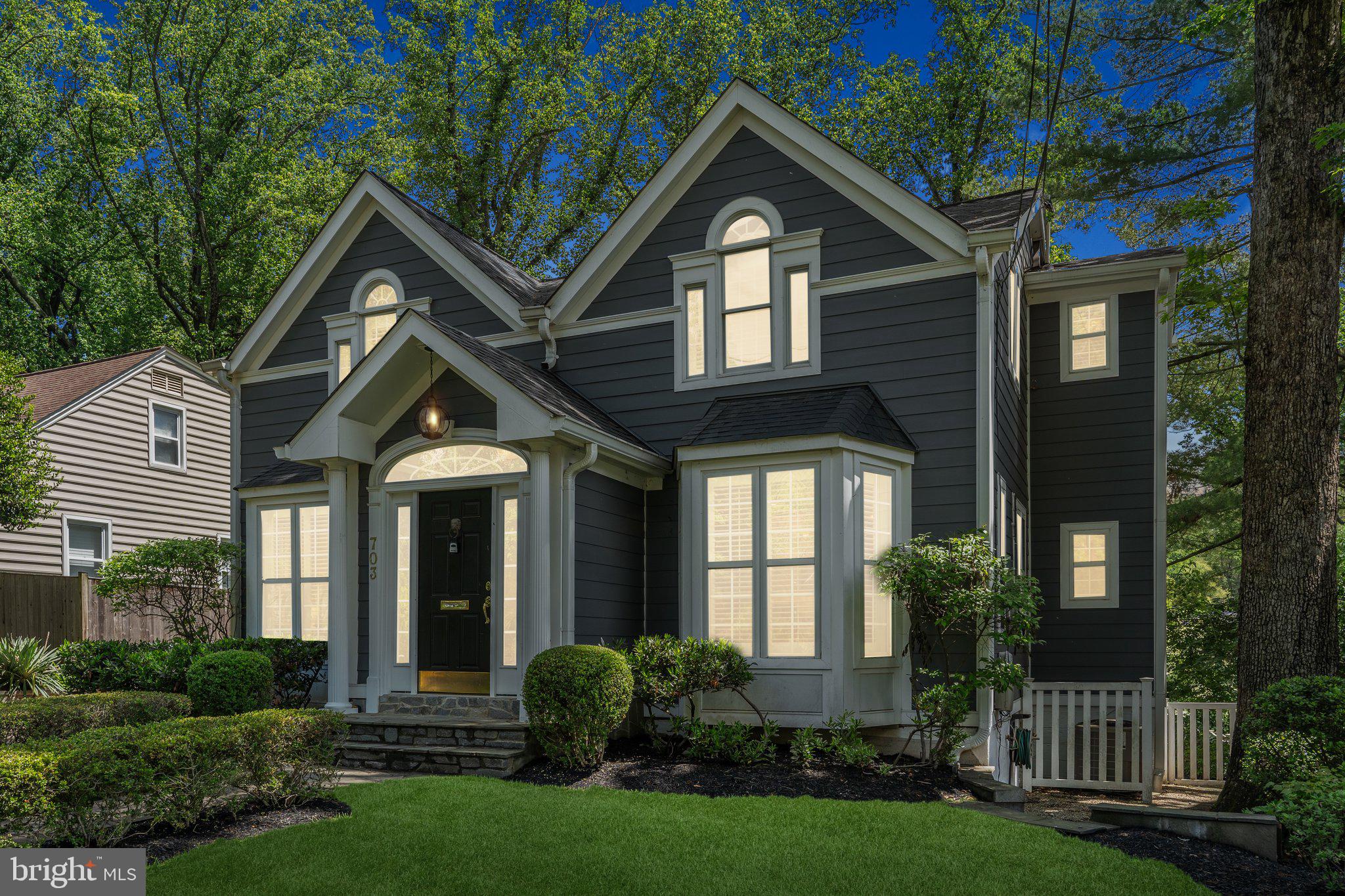 703 Roxboro Road Rockville, MD 20850 - Photo 3 of 55 a front view of a house with a yard