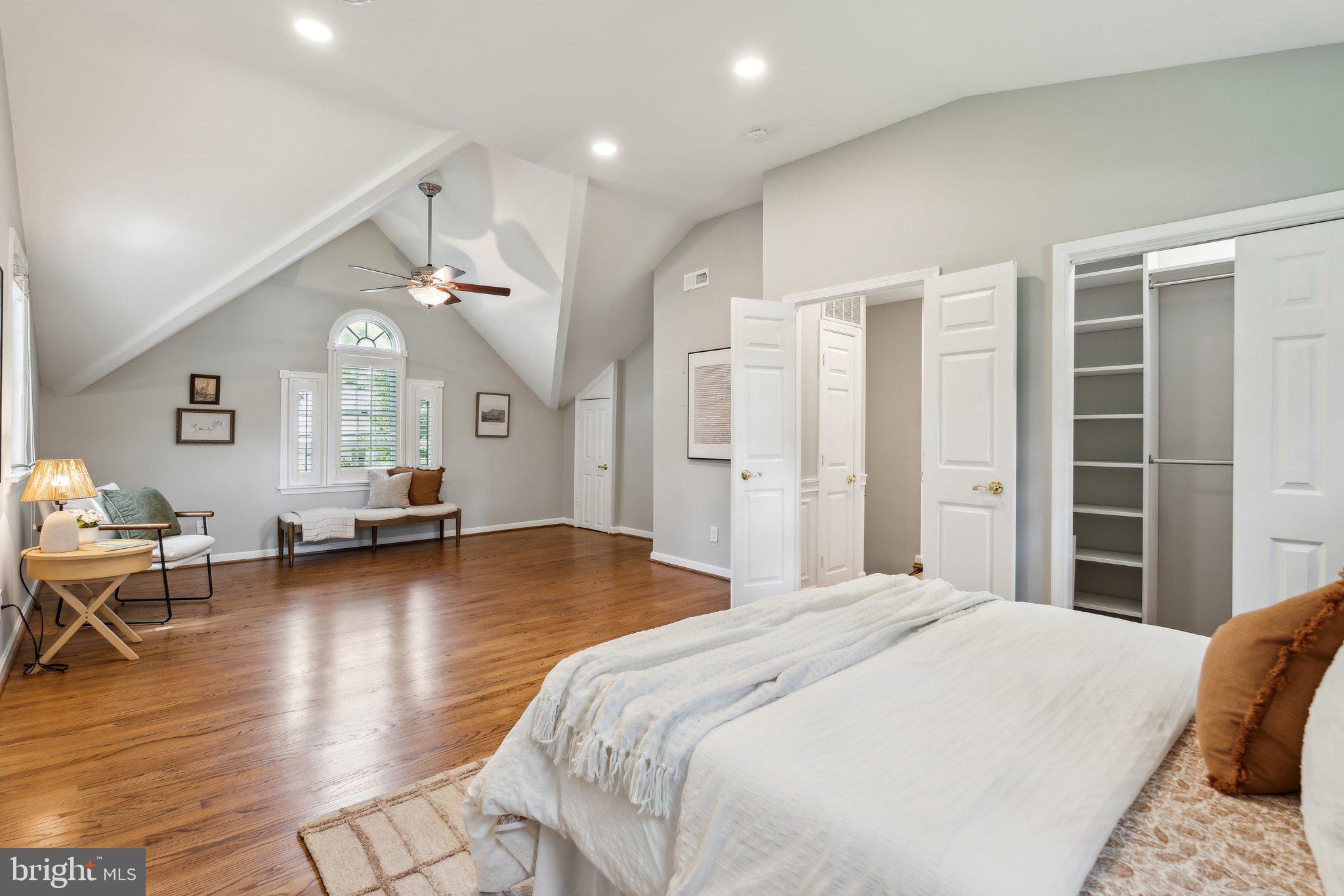 703 Roxboro Road Rockville, MD 20850 - Photo 31 of 55 a bedroom with a bed and glass table