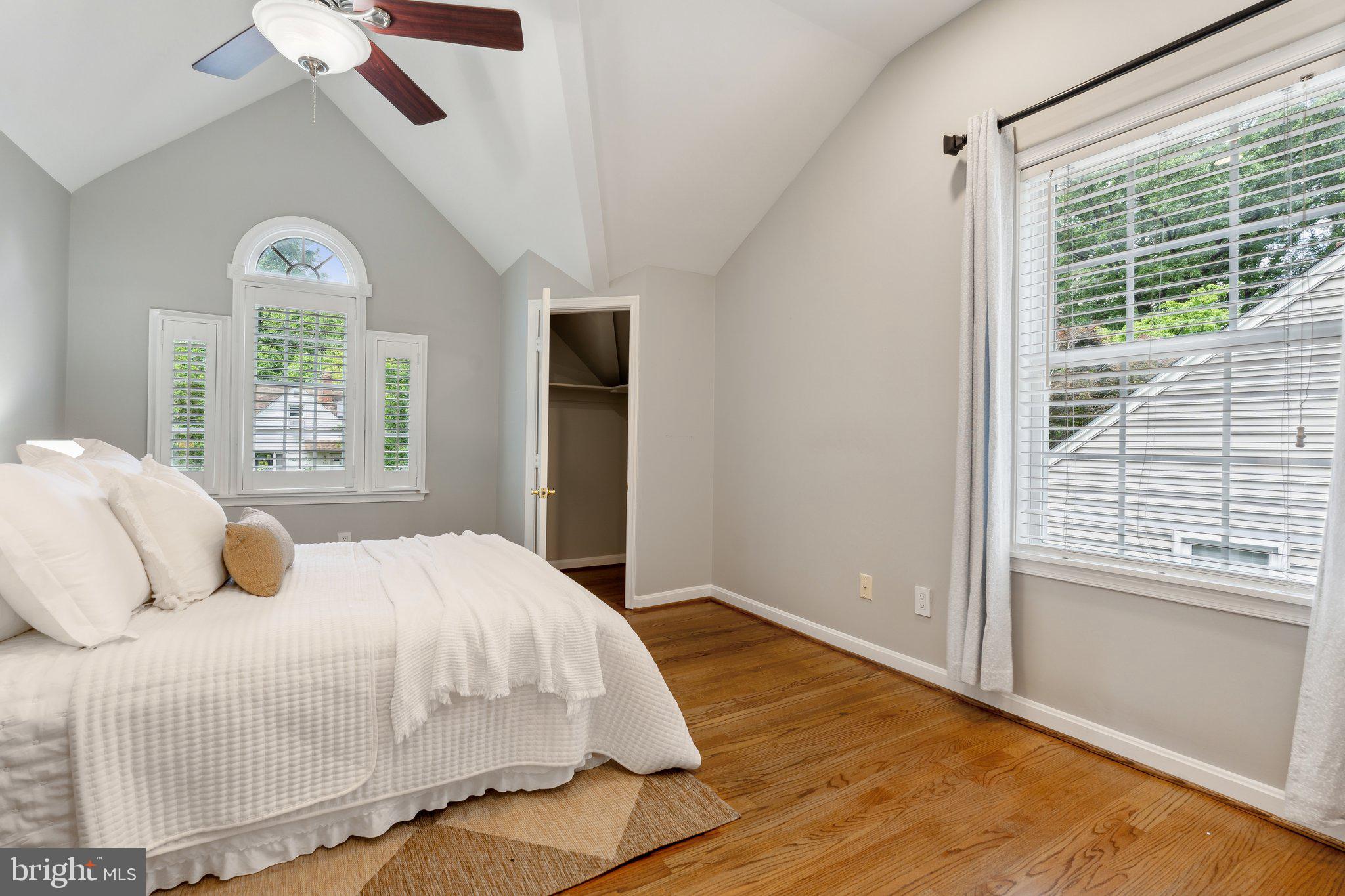 703 Roxboro Road Rockville, MD 20850 - Photo 39 of 55 a bedroom with a large bed and a window