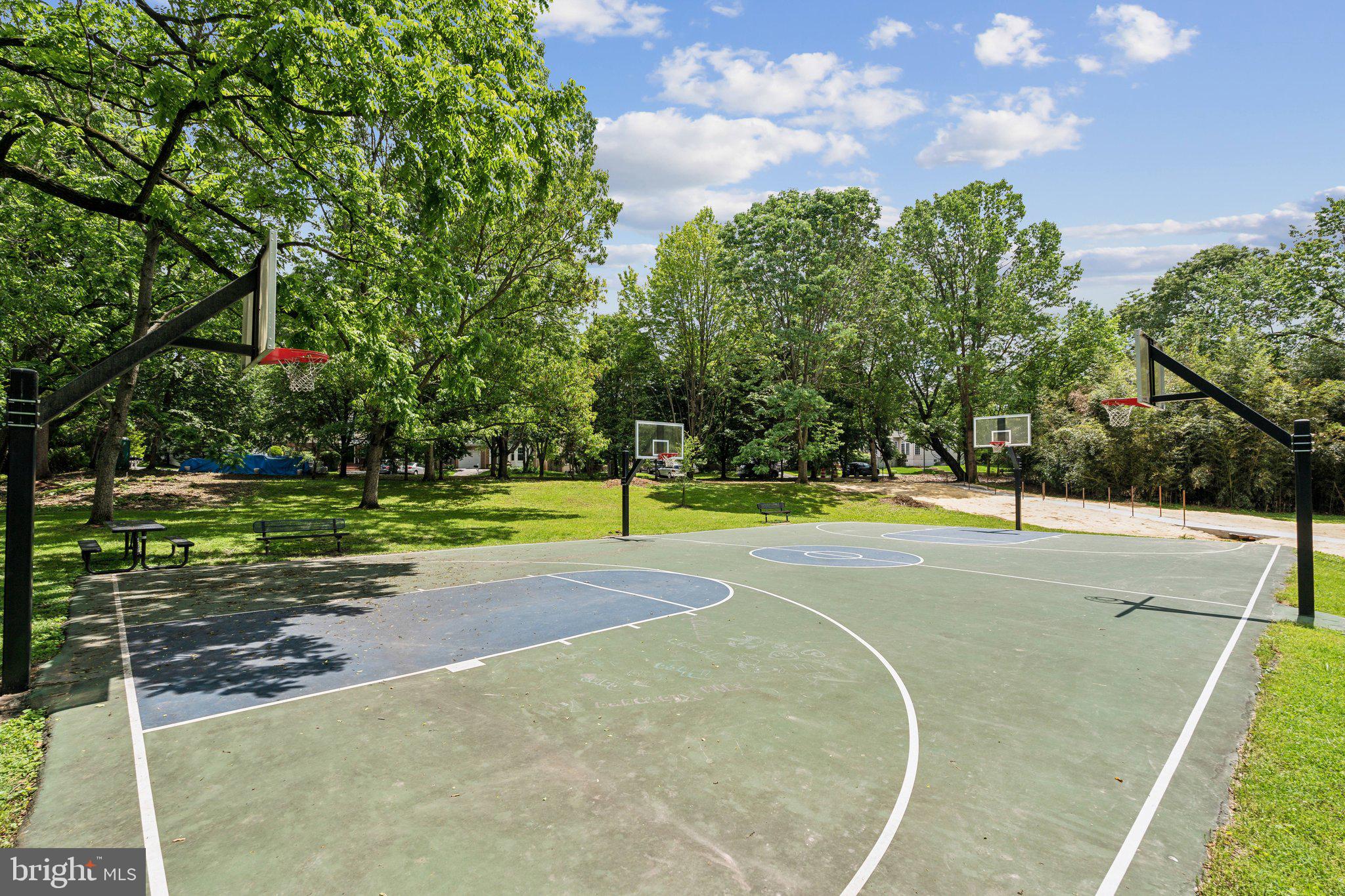 703 Roxboro Road Rockville, MD 20850 - Photo 48 of 55 a view of a swimming pool with a yard