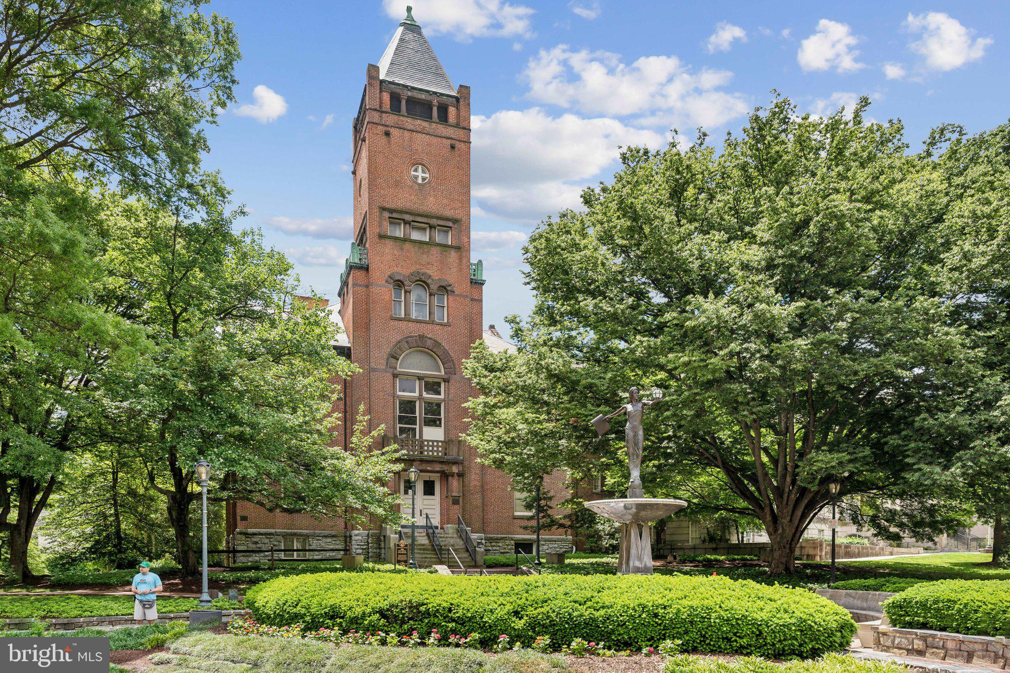 703 Roxboro Road Rockville, MD 20850 - Photo 51 of 55 a front view of a house with a yard and a tree