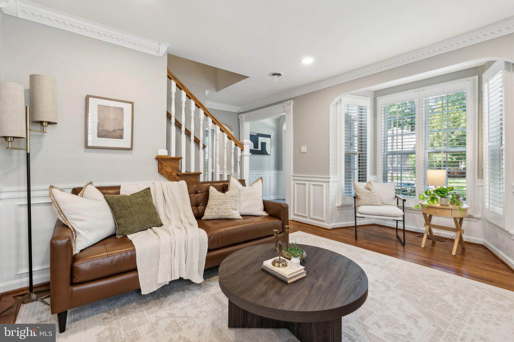 703 Roxboro Road Rockville, MD 20850 - Photo 9 of 55 a living room with furniture and a table